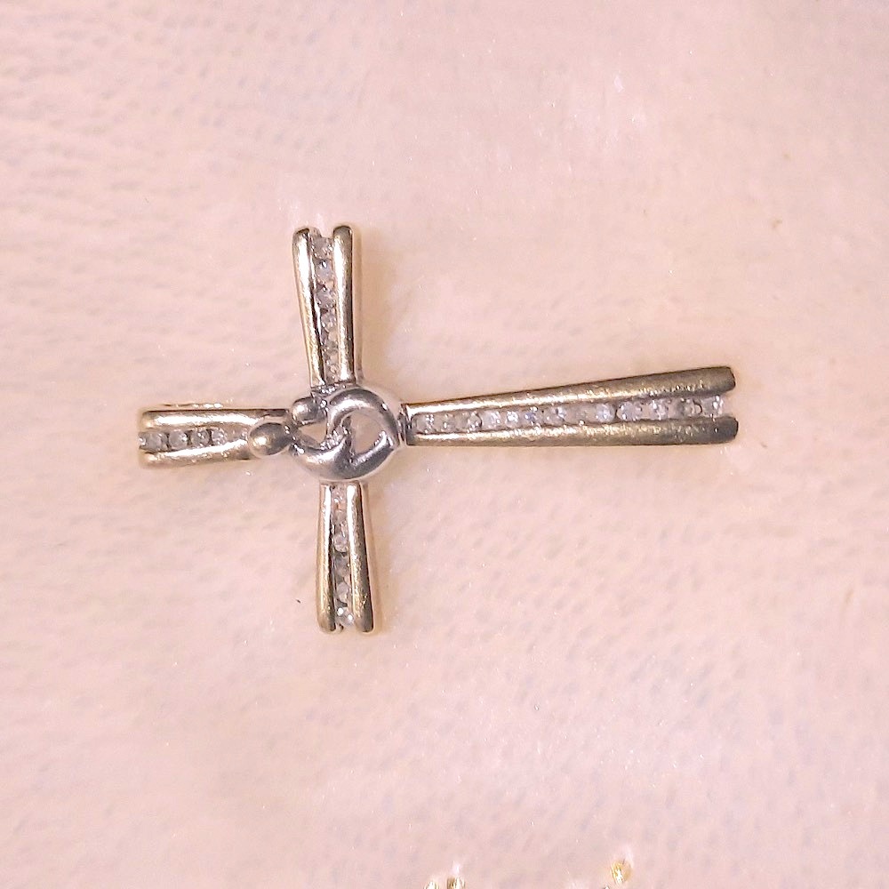 10K gold with diamonds cross pendant. Mother and child